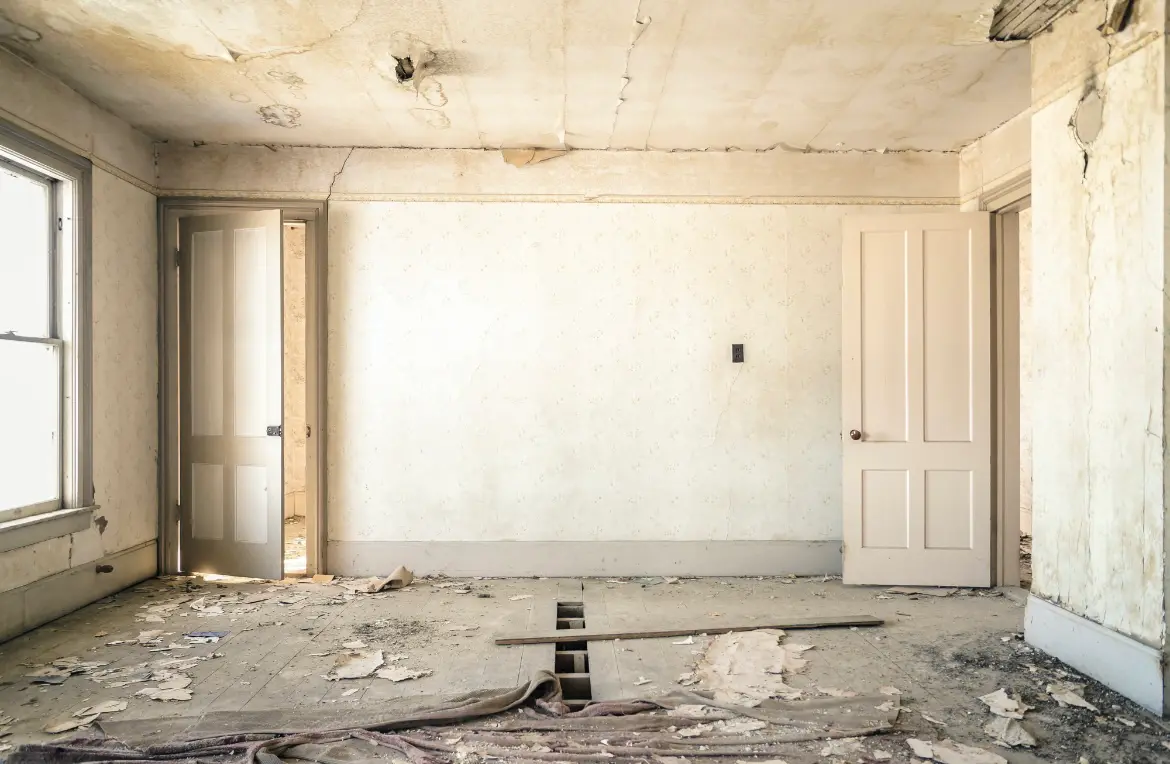 Waste disposal crew managing a cleanout project in Lansing